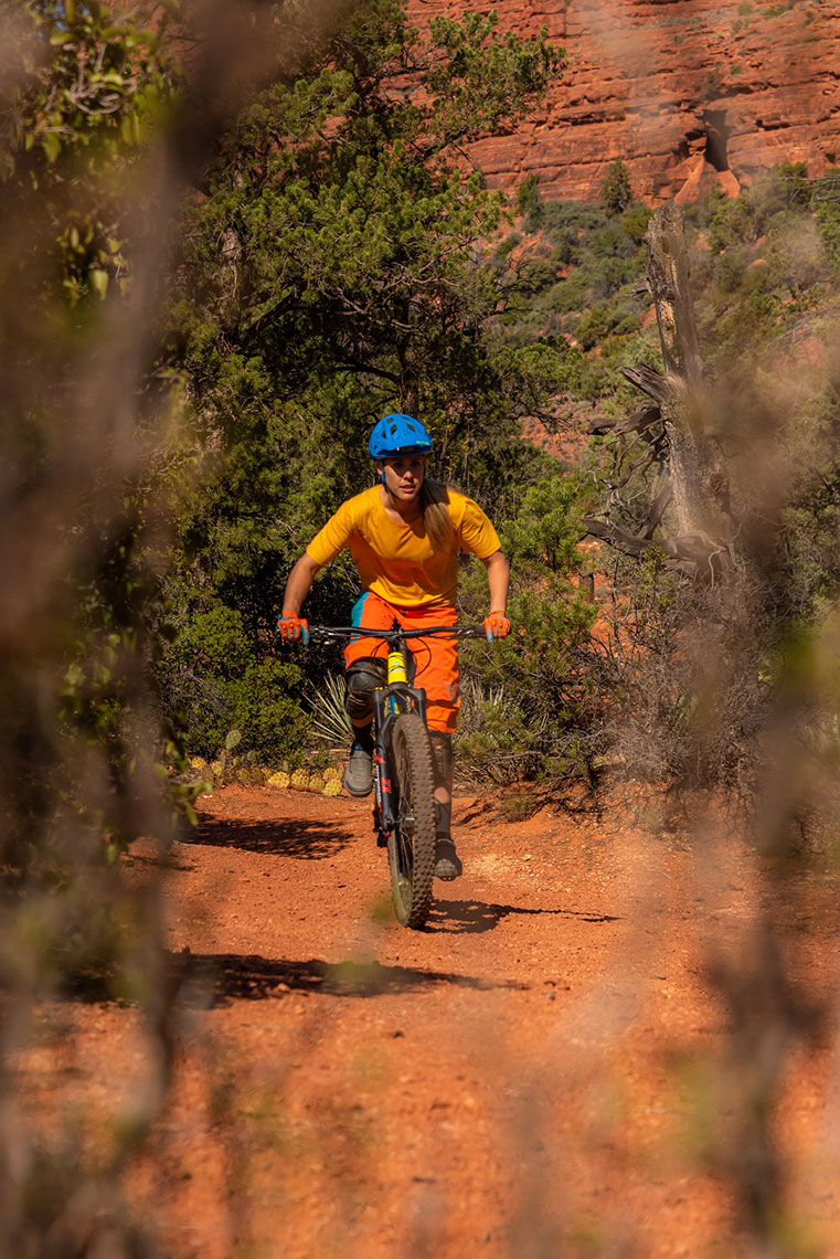 Mountain Biker Lauren Gregg cruising red rock of Sedona, Az. Daniel Britton, Lifestyle, Adventure Photographer